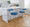Rhonda Glam Counter Stool in Gold Metal and Blue Velvet- Set of 2 — lifestyle photo 4
