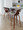 Curvo counter stool in Walnut Wood, Grey PU, Chrome Metal, featuring swivel and wood frame