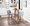 Tintori counter stool in Walnut Wood, Grey Fabric, Black Metal, featuring metal footrest