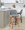 Tintori counter stool in Walnut Wood, Grey Fabric, Black Metal, featuring metal footrest