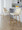 Tintori counter stool in Cream PU, Gold Metal, featuring swivel and metal footrest