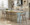 Winston Farmhouse Counter Stool in Whitewashed Wood and Antique Copper Metal — lifestyle photo 2