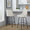 Marcel counter stool in Black Metal, Cream Fabric, Brass Metal, featuring swivel