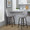 Studded Marcel 27" Transitional Fixed-Height Counter Stool with Swivel in Walnut Glazed Wood and Light Grey Fabric with Brass Nailhead Trim and Round Black Metal Footrest- Set of 2 — lifestyle photo 2