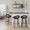 Grotto Upholstered 30" Contemporary Fixed-Height Barstool with Swivel in Walnut Wood and Black Faux Leather with Round Black Metal Footrest- Set of 2 — lifestyle photo 1