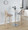 Charlotte bar stool in Whitewashed Wood, Chrome Metal, Light Grey Fabric, featuring swivel and upholstered seat