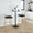 Charlotte Glam 30" Glam/art Deco Fixed-Height Barstool with Swivel in Gold Metal and Black Velvet with Round Footrest- Set of 2 — lifestyle photo 1