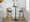 Cosi bar stool in Light Grey Wood, Black Metal, Black PU, close-up detail, featuring swivel and wood frame