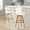 Cosmo Mid-Century 29" Fixed-Height Barstool with Swivel in Walnut Bamboo and Cream Noise Fabric with Round Black Metal Footrest — lifestyle photo 1