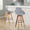 Cosmo Mid-Century 29" Fixed-Height Barstool with Swivel in Walnut Bamboo and Grey Noise Fabric with Round Black Metal Footrest — lifestyle photo 2