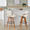 Cosmo bar stool in Walnut Bamboo, Cream PU, Black Metal, featuring swivel and metal footrest
