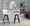 Cosmo 30" Contemporary Fixed-Height Barstool with Swivel in Black Wood and Cream Faux Leather with Round Black Metal Footrest- Set of 2 — lifestyle photo 1