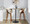 Curvo bar stool in Walnut Wood, Cream Fabric, Chrome, featuring swivel and wood frame