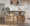 Curvo bar stool in Walnut Wood, Grey Fabric, Chrome, featuring swivel and wood frame
