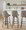 Diana bar stool in Walnut Wood, Brown PU, Black Metal, featuring swivel and wood frame