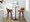 Daniella 30" Contemporary Fixed-Height Barstool with Swivel in Walnut Glazed Wood and Camel Faux Leather with Round Black Metal Footrest- Set of 2 — lifestyle photo 4