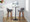 Daniella 30" Contemporary Fixed-Height Barstool with Swivel in Walnut Wood and Grey Faux Leather with Round Black Metal Footrest- Set of 2 — lifestyle photo 4