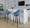 Fabrizzi bar stool in Walnut Glazed Wood, Blue Noise Fabric, Black Metal, featuring swivel and wood frame