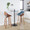 Fabrizzi 30" Mid-Century Modern Fixed-Height Barstool with Swivel in Walnut Wood and Blue Fabric with Round Chrome Metal Footrest- Set of 2 — lifestyle photo 3