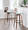 Folia bar stool in Walnut Wood, Black Metal, Teal Fabric, featuring swivel and wood frame