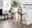 Folia bar stool in Walnut Wood, Black Metal, Teal Fabric, featuring swivel and wood frame