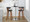 Gardenia 30" Mid-Century Modern Fixed-Height Barstool with Swivel in Walnut Wood and Charcoal Fabric with Round Chrome Metal Footrest- Set of 2 — lifestyle photo 3
