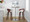 Grotto bar stool in Mahogany Wood, Chrome Metal, White PU, featuring swivel and upholstered seat