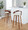 Grotto bar stool in Walnut Wood, Chrome Metal, Cream PU, featuring swivel and wood frame