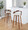 Grotto bar stool in Walnut Wood, Chrome Metal, Cream PU, featuring swivel and wood frame
