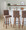 Hank 30" Contemporary Fixed-Height Barstool with Swivel in Walnut Wood and Brown Fabric with Round Black Metal Footrest- Set of 2 — lifestyle photo 1