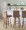 Hank 30" Contemporary Fixed-Height Barstool with Swivel in Walnut Wood and Brown Fabric with Round Black Metal Footrest- Set of 2 — lifestyle photo 2