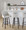 Hannah bar stool in Walnut Glazed Wood, Cream Fabric, Black Metal, featuring swivel and wood frame