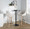 Hannah bar stool in Whitewashed Wood, Cream Fabric, Black Metal, featuring swivel and upholstered seat