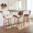 Lombardi bar stool in Walnut Wood, Black Metal, Cream PU, featuring swivel and upholstered seat