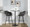 Margarite 30" Contemporary Fixed-Height Barstool in Black Metal and Grey Faux Leather with Square Black Metal Footrest- Set of 2 — lifestyle photo 2