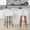 Matisse High Back 30" Contemporary Fixed-Height Barstool in Walnut Wood and Cream Fabric with Round Black Metal Footrest- Set of 2 — lifestyle photo 1