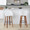 Matisse bar stool in Walnut Wood, White PU, Black Metal, featuring swivel and wood frame