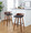 Maya 30" Mid-Century Modern Fixed-Height Barstool with Swivel in Walnut Wood and Charcoal Fabric with Square Black Metal Footrest- Set of 2 — lifestyle photo 3