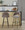 Renee Upholstered 30" Contemporary Fixed-Height Barstool in Black Metal and Brown Fabric with Square Footrest- Set of 2 — lifestyle photo 1