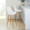 Studded Marcel 30" Contemporary Fixed-Height Barstool in Gold Metal and White Faux Leather with Gold Nailhead Trim and Square Gold Metal Footrest- Set of 2 — lifestyle photo 1