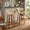 Curvo bar stool in Walnut Wood, Black Metal, Cream PU, featuring swivel and wood frame