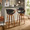 Curvo bar stool in Walnut Wood, Chrome Metal, Black PU, featuring swivel and wood frame