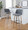 Toriano 30" Contemporary Fixed-Height Barstool with Swivel in Light Grey Wood and Grey Fabric with Round Black Metal Footrest- Set of 2 — lifestyle photo 1