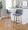 Toriano 30" Contemporary Fixed-Height Barstool with Swivel in Light Grey Wood and Grey Fabric with Round Black Metal Footrest- Set of 2 — lifestyle photo 2