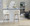 Tintori bar stool in Whitewashed Wood, Cream Fabric, Black Metal, featuring swivel and wood frame