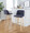 Toriano 30" Contemporary Fixed-Height Barstool with Swivel in Natural Wood and Blue Fabric with Round Chrome Metal Footrest- Set of 2 — lifestyle photo 1