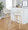 Toriano 30" Contemporary Fixed-Height Barstool with Swivel in Natural Wood and Cream Noise Fabric with Round Chrome Metal Footrest- Set of 2 — lifestyle photo 2