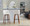 Tintori bar stool in Walnut Wood, Cream Noise Fabric, Black Metal, featuring swivel and metal footrest