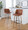 Toriano 30" Contemporary Fixed-Height Barstool with Swivel in Light Grey Wood and Camel Faux Leather with Round Black Metal Footrest- Set of 2 — lifestyle photo 2