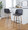 Toriano 30" Contemporary Fixed-Height Barstool with Swivel in Light Grey Wood and Grey Faux Leather with Round Black Metal Footrest- Set of 2 — lifestyle photo 2